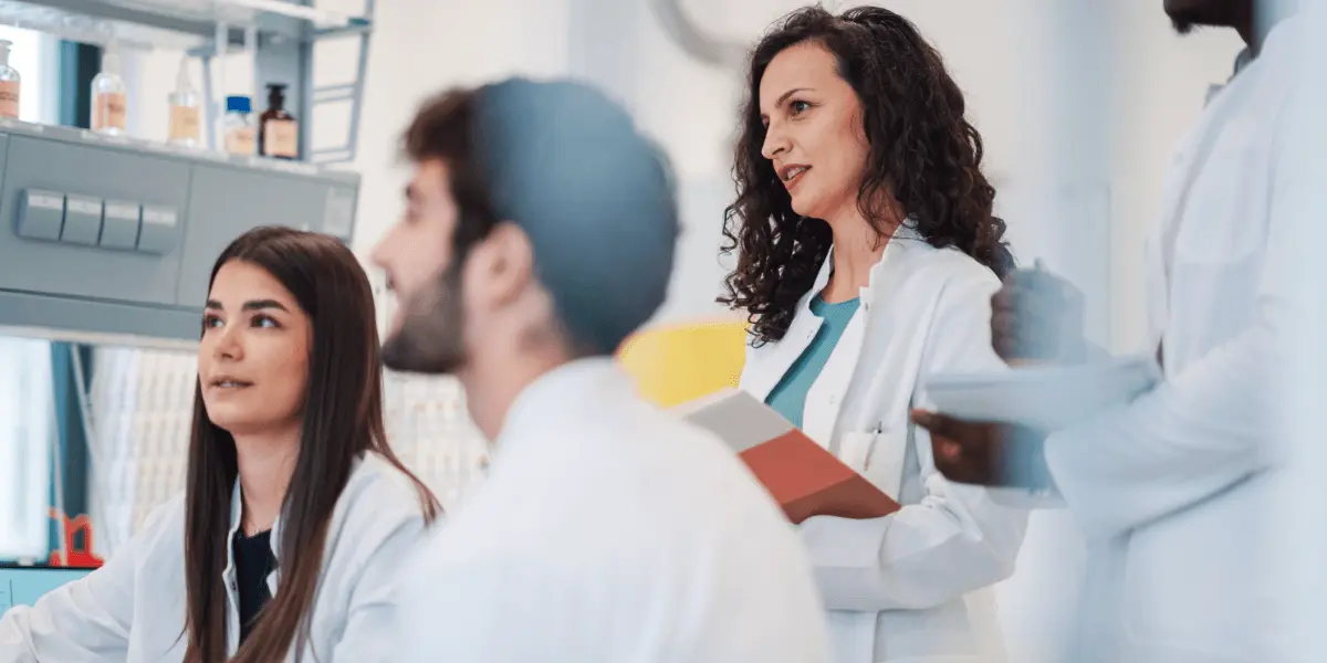 several scientists all working together on a project