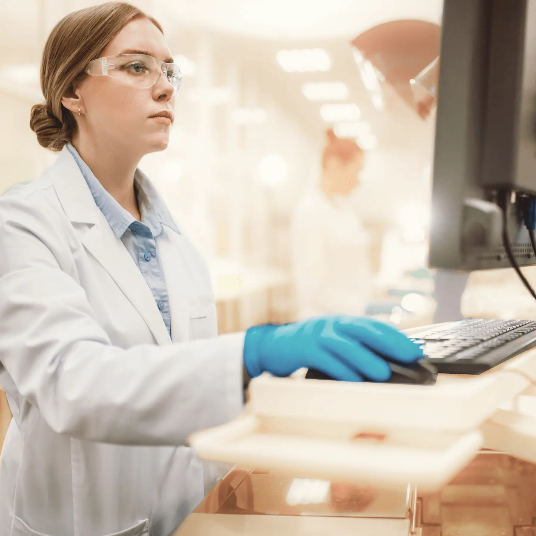 female scientist works on data at a computer