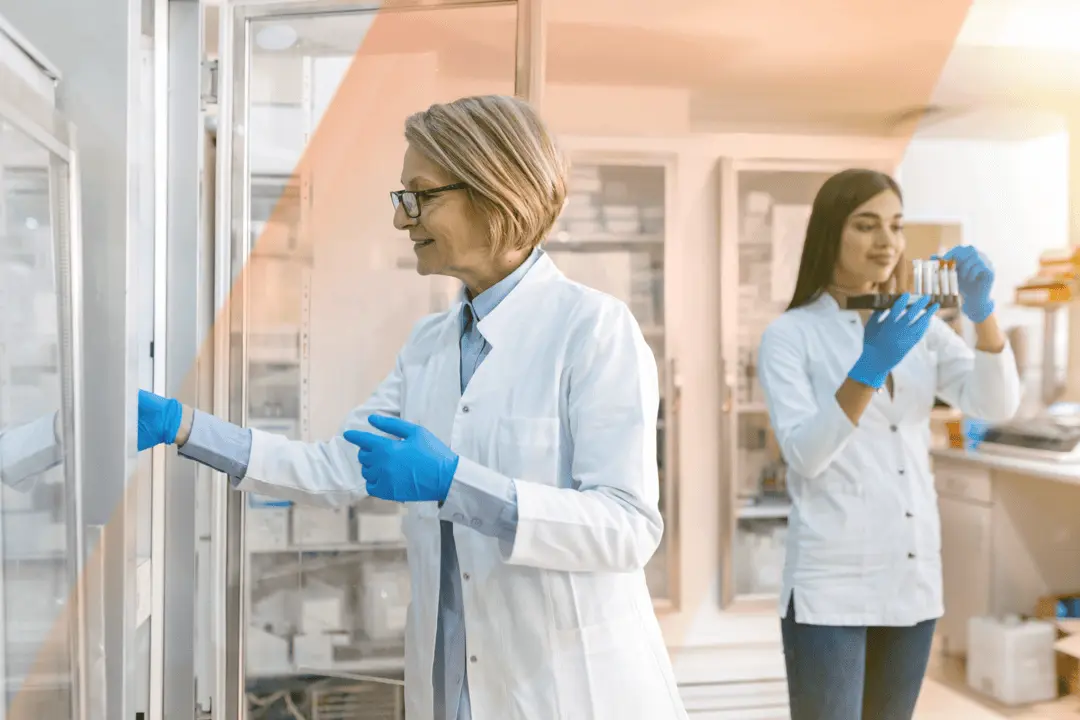 two scientists work in a lab