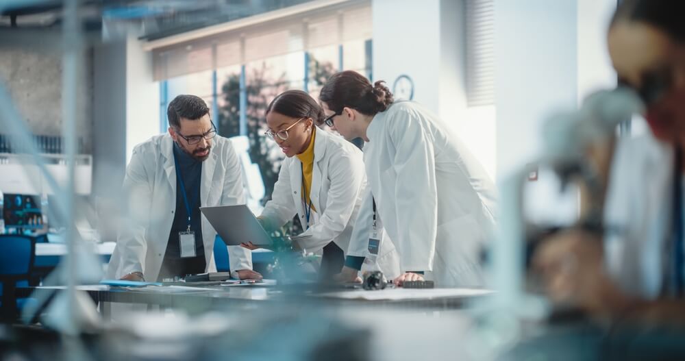 scientists working together in a lab